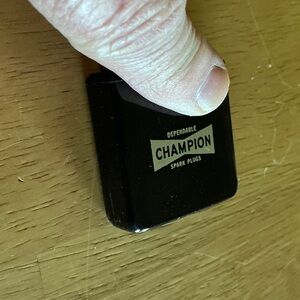 Champion Black and Gold Spark Plug Tin